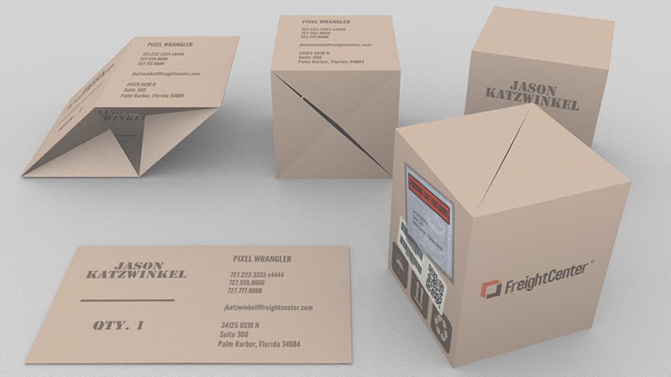 A foldable business card that flattens out or folds into a cardboard box.